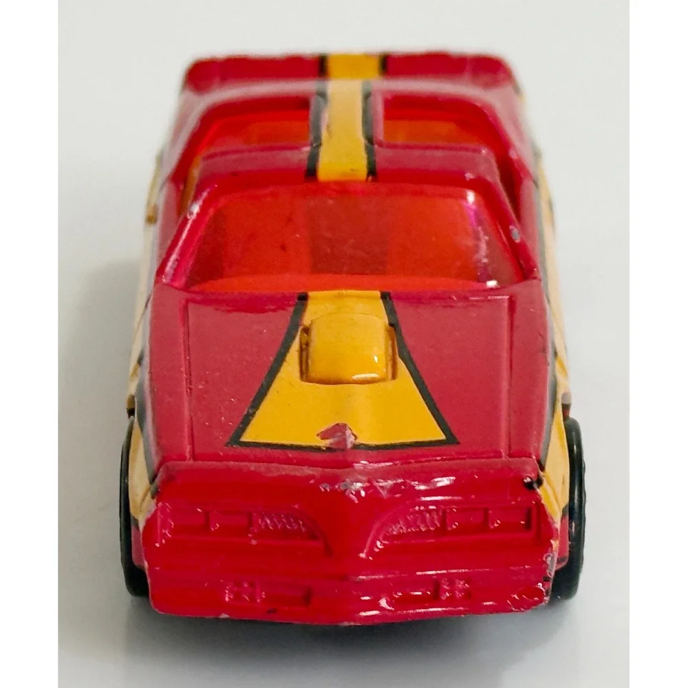 Racing Champions 1979 Pontiac Firebird Trans Am Kids 1/64 Red Yellow Stripes